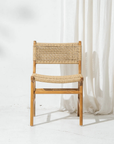 Khairi teak woven dining chair with rope weave by Inartisan