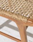 Close-up of a woven dining chair