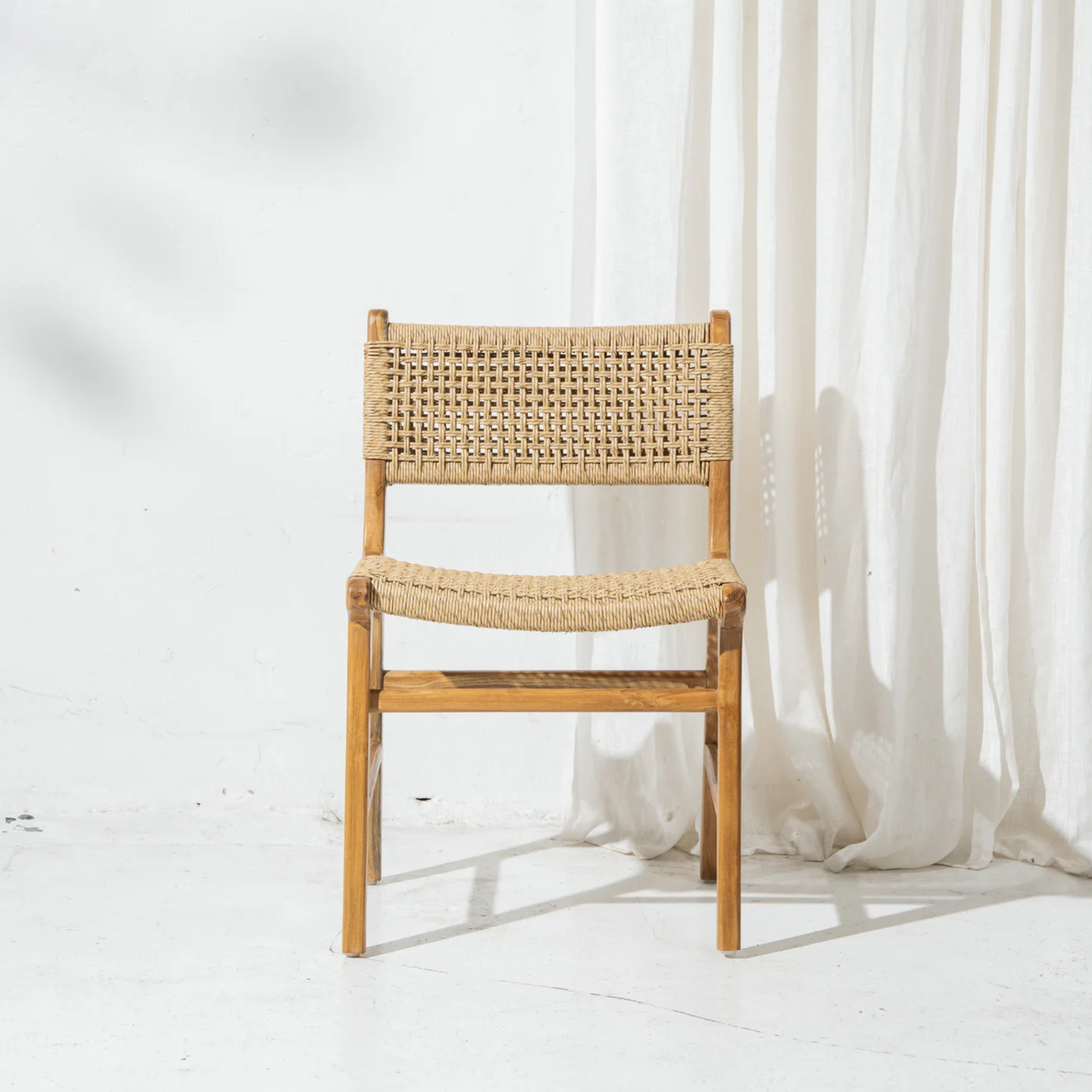 Khairi teak woven dining chair with rope weave by Inartisan