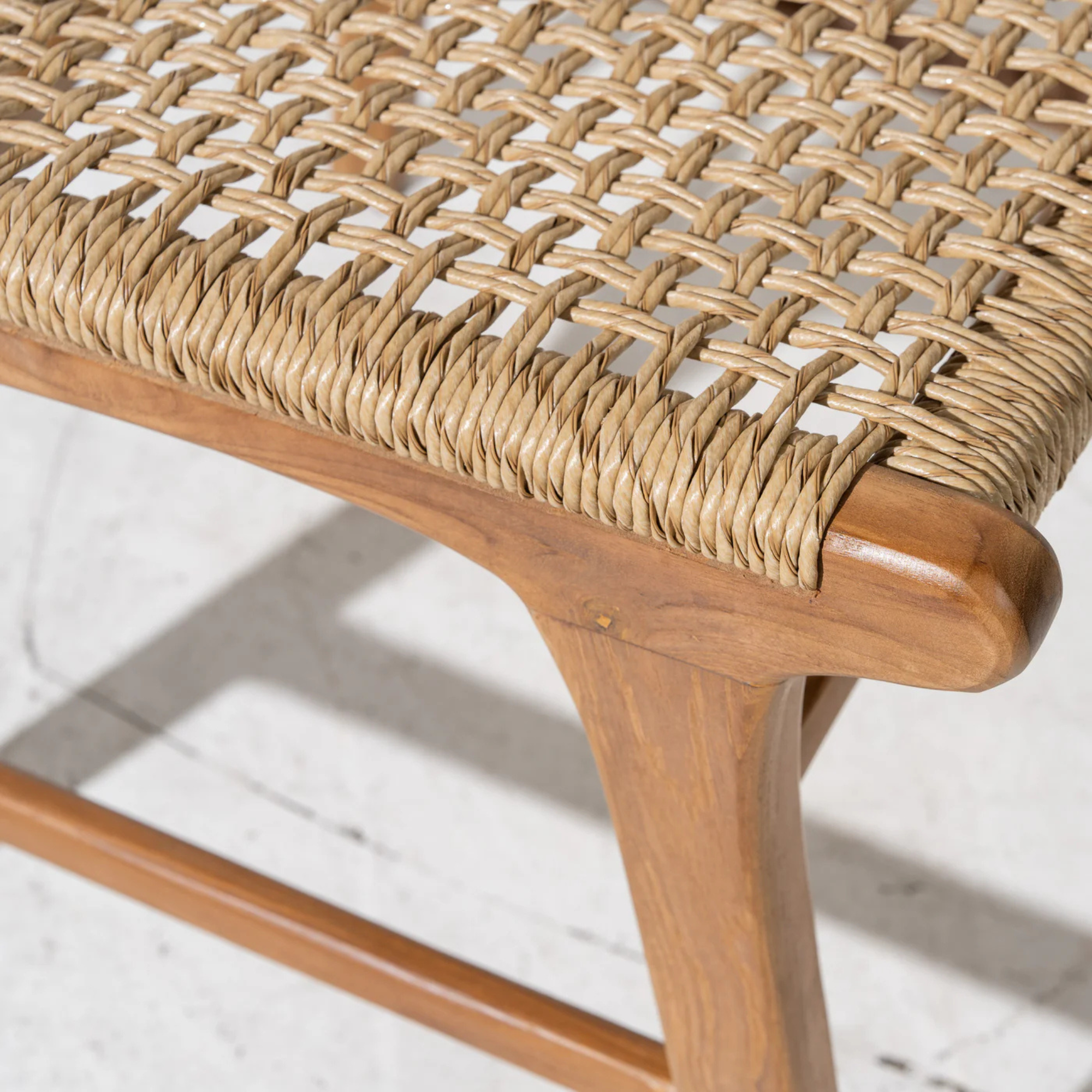 Close-up of a woven dining chair